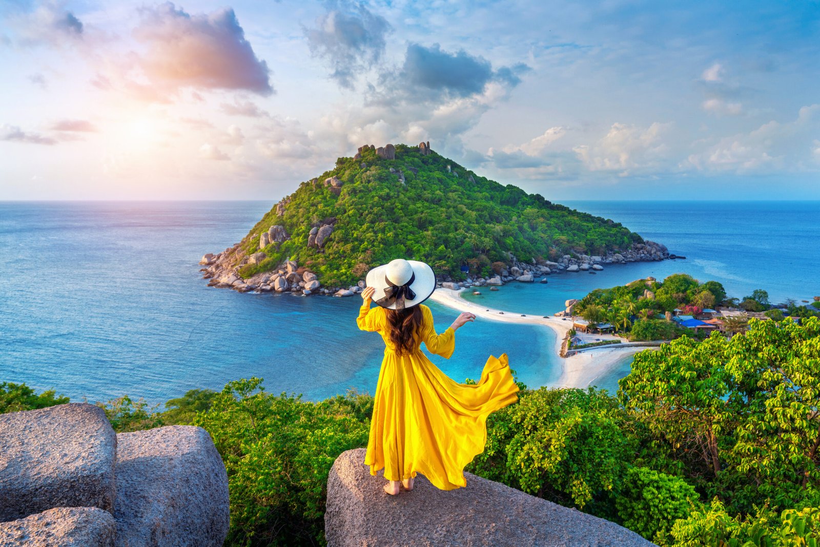 Woman in yellow dress overlooking Koh Nang Yuan island.